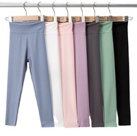 Vente en gros de vêtements d'entraînement doux et hautement extensibles pour enfants leggings de sport respirants et minces en nylon pour enfants pantalons de yoga pour enfants leggings de yoga pour enfants