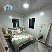 Conteneur modulaire préfabriqué pliable et extensible de 40 pieds, luxueux, respirant et moderne, pour logement d'appoint, bureau mobile ou usage en station balnéaire