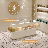 Bureau de réception moderne de la taille du client avec lumière LED pour les magasins de vêtements, les salons de manucure et les hôtels-conception de comptoir de peinture pour la réception