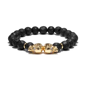 Neues Design Lava Stone Gold Schädel Charm Elastic Jewelry Armband für Männer