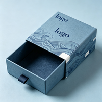 Boîte d'emballage de bijoux en carton rigide carré de luxe personnalisée avec tiroirs coulissants, finition mate artistique, options de logo personnalisé