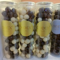 Bonbons solides enrobés de chocolat, saveur pêche blanche, 148g, prix de gros