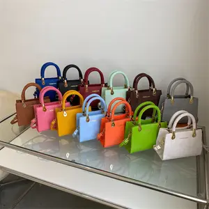2024 tas persegi kecil batu baru tren Fashion tekstur tas tangan gaya Luar Negeri wanita tas selempang tenun kualitas tinggi terlaris
