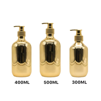 PET Runde Plastik-Lotionflasche 300ml/400ml/500ml Fassungsvermögen Gold Silber Galvanisiert mit Pumpe für Shampoo Duschgel MOQ 10 Stück