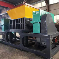 Déchets de plastique Pneus en caoutchouc usagés pour voiture Machines de recyclage Broyeur à double arbre Broyeur de pneus