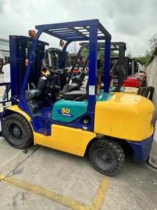 Used Komatsu FD30 Diesel 3 Tons 4WD <b>Forklift</b> with Hydraulic Side Shifter Rough Terrain Solid Tires Multi-Stage Mast - Product Image 2