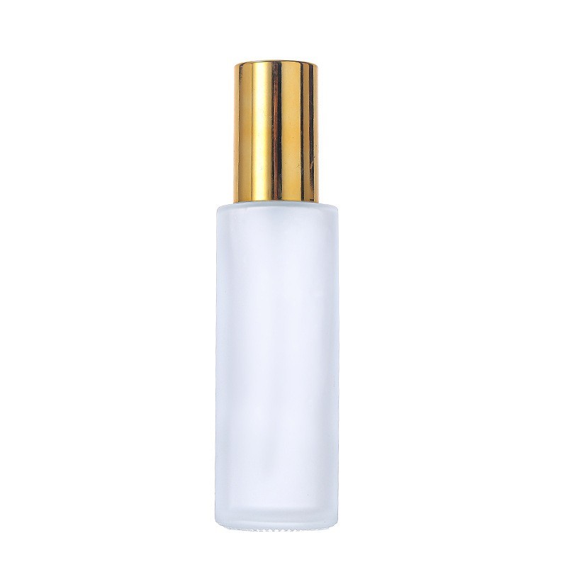 Bottiglia in vetro smerigliato + pompa dorata + tappo dorato