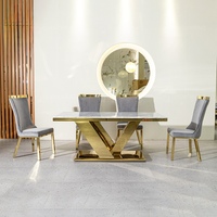 Table de salle à manger carrée moderne de luxe en gros, plateau en marbre personnalisable, base en X dorée, gris