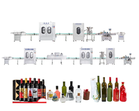 Ligne de remplissage d'alcool automatique électrique contrôlée par PLC de haute précision pour bouteilles en verre de vin et de whisky avec une rigidité élevée