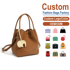 กระเป๋าถือหนังแท้พรีเมียม สีน้ำตาลคาราเมล สไตล์สดใส สำหรับใช้ในชีวิตประจำวัน ดีไซน์เฉพาะตัว ใช้งานได้หลากหลาย ทรงถัง ขายส่งสำหรับการค้าต่างประเทศ - Product Image 1