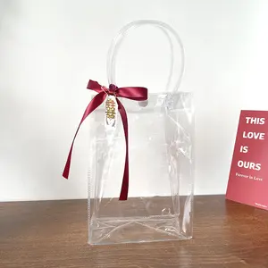 Factory direct sale clear laser PVC tote shopping bags custom logo PU pink handle gift bag for wedding