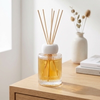 Bouteille diffuseur de parfum cylindrique transparente en verre pour la maison, avec logos personnalisables, vente en gros.