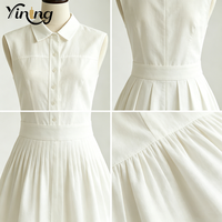 Robe sans manches blanche de style universitaire, nouvelle collection, avec col à revers et boutonnage frontal, et design de gilet cintré à la taille, pour la vente en gros sur mesure en usine de vêtements
