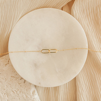 eManco 10PCS Collier délicat en acier inoxydable à double maillon avec nœud ovale entrelacé pour femme, idéal pour le bureau et les tenues quotidiennes