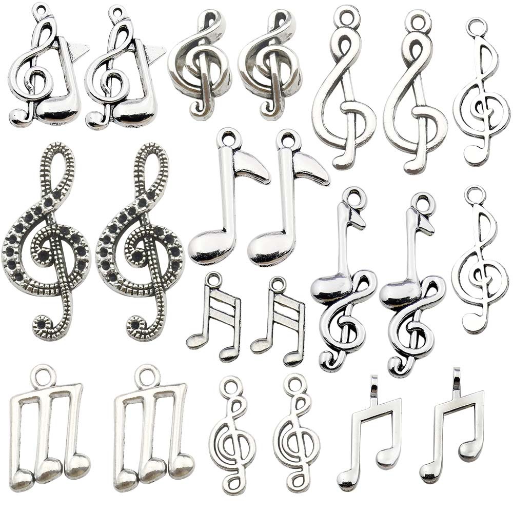Mélange de 20 symboles musicaux anciens en argent - 24g - SN53