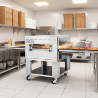 Les fours à pizza électriques à convoyeur à impulsion utilisés par les restaurants de restauration rapide, offrant une grande efficacité de production.
