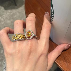 แหวนเงินแท้ S925 รูปทรงไข่ ประดับเพชรคาร์บอนสูงสีเหลืองอ่อน ระยิบระยับดุจเปลวไฟ ลายดอกน้ำแข็ง ทรงรี สีเหลือง ทันสมัย - Product Image 2