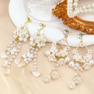 Moda Bohemia joyería pendientes resina perla flor larga borla gota Boho pendientes para mujer