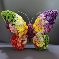 Arc de papillon de rangée de fleurs artificielles réalistes faites à la main pour décor de boutique de toile de fond de mariage caractéristique de Noël