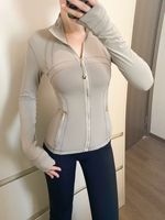 Veste de yoga pour femme en gros, coupe ajustée, respirante, manches longues, col montant, fermeture éclair frontale, vêtement de fitness tendance