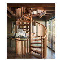 Escalier intérieur en colimaçon en fer forgé pour petits espaces moderne et compact