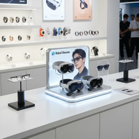 Support d'affichage de lunettes intelligentes IA en acrylique personnalisé Apache avec boîte à lumière LED pour présentoir de lunettes pour les magasins électroniques et de détail