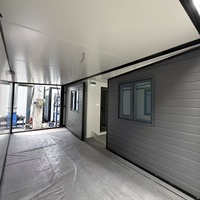 Bâtiment modulaire préfabriqué de 20 pieds avec revêtement en briques grises, maison conteneur extensible pour bureau de chantier, salle de réunion, hébergement temporaire