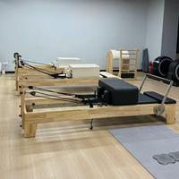 Reformer de Pilates de Madera de Roble Clásico Profesional de Alta Calidad con Base Telescópica para Ejercicios de Core, Comercial y de Largo Alcance