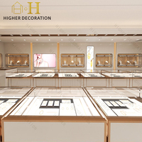 Comptoir d'exposition de bijoux de luxe, vitrine à bijoux en verre sur mesure avec éclairage LED