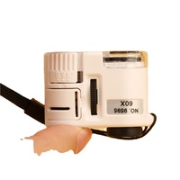 Mini Microscopio de bolsillo con luz LED para teléfono móvil, lupa de Clip portátil, 60 aumentos