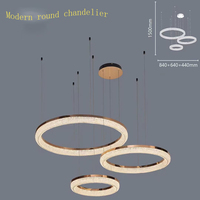 Lustre en cristal moderne de luxe sur mesure en acier inoxydable avec LED, télécommande dorée, grandes bagues en cristal, éclairage d'intérieur