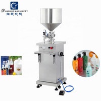Machine de remplissage pneumatique verticale semi-automatique de pâte liquide de pot de tube de bouteille d'acier inoxydable