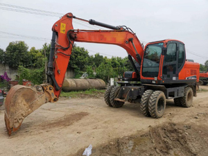 Excavadora de Ruedas de 15 Toneladas DX150W Económica con Capacidad de Cucharón de 0.6m³ y Cambio Rápido en Venta - Product Image 1