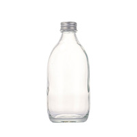 Bouteille en verre sodocalcique transparent scellée en stock pour jus infusé à froid, thé au lait, vin de fruits, boissons; utilisation quotidienne DIY, sérigraphiée