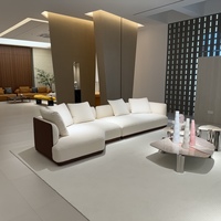 Canapé modulaire incurvé de luxe en deux parties en tissu crème avec dossier en cuir marron, canapé d'angle pour salon