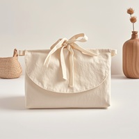 Vente en gros de sac à rabat en coton recyclable personnalisé sac à poussière sacs d'enveloppe d'emballage de vêtements