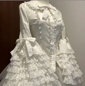 Chemise pour femme de style Lolita, col <span class=keywords><strong>Peter</strong></span> <span class=keywords><strong>Pan</strong></span>, manches évasées, dentelle, nœud, volants, blanc uni, coton polyester, printemps-été, surdimensionnée - Product Image 1
