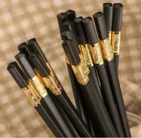 Özel logo siyah çin alaşımlı plastik düğün çubuklarını toptan metal kullanımlık suşi ambalaj çubuklarını hediye