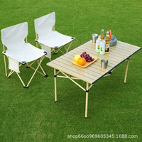Table pliante moderne en alliage d'aluminium - Pieds rétractables et design roulant, portable pour le camping, la pêche et la plage