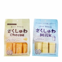 Gâteaux de riz au lait à texture semi-molle cuits au four, saveur sucrée et banane, craquelins de riz sains, faibles en gras, nutritifs, en boîte, en-cas