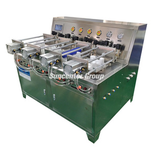 Máquina de enchimento automática quatro do gás do controle do PLC de Suncenter-garrafa pneumática do creme 500ml do tanque do gás de Workstation 1L/2.2L/3.3L N2O