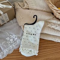 Chaussettes pour femmes préparées pour l'hiver, chaussettes chaudes en tricot à motif à pois pour la vente en gros
