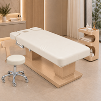 Table de massage électrique professionnelle haut de gamme avec dossier réglable, cadre en bois et chauffage, idéale pour hôtels, salons et centres de bien-être