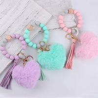 Magnifique porte-clés bracelet en silicone perlé. Pendentif cœur en peluche douce à faire soi-même. Accessoire de clé en plastique, cadeau en promotion.