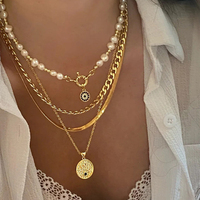 Collier pendentif circulaire œil de démon : Chaîne multicouche hip-hop tendance pour la Saint-Valentin
