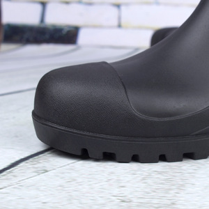 Botas de seguridad de PVC negras de caña alta para hombre con puntera de acero, antideslizantes, de color sólido, con protección superior extendida. - Product Image 4