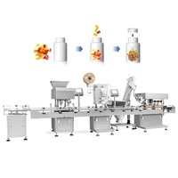 Ligne de remplissage entièrement automatique pour petits objets avec insérateur de déshydratant, compteur, capsuleuse et scelleuse pour bocaux en plastique et en verre
