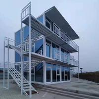 Construction de maison temporaire préfabriquée à faible coût de haute qualité Dortoir Maison modulaire détachable Immeuble de bureaux en conteneur de 3 étages