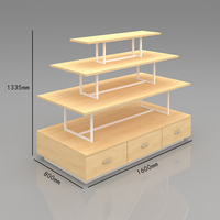 Meuble d'îlot rectangulaire multi-niveaux pour supermarché, présentoir pour magasin maternelle et infantile, vêtements et chaussures pour bébés, étagère de table à eau courante