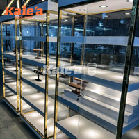 Vitrine à bijoux en verre avec cadre doré luxueux, éclairage LED, présentoir intelligent pour lunettes, adapté aux boutiques et centres commerciaux